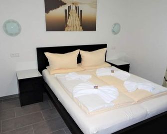 Deluxe Apartment, 86qm, Balkon, 2 Schlafzimmer, max. 8 Personen - Rust - Bedroom