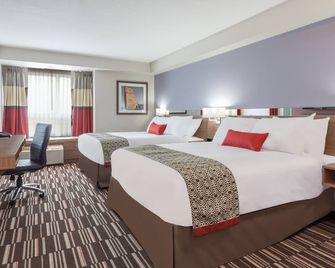 Microtel Inn & Suites by Wyndham Ladysmith Oyster Bay - ליידיסמית' (קנדה) - חדר שינה