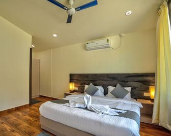 Amore Serenity Resort - Арамбол - Спальня