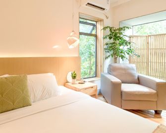 Zen Tea House Elephant Trunk Hill Park - Guilin - Schlafzimmer