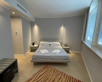 Golgi Suite - Pavia - Camera da letto