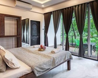Nilgiri Farms Villa Lonavala - Lonavala - Schlafzimmer