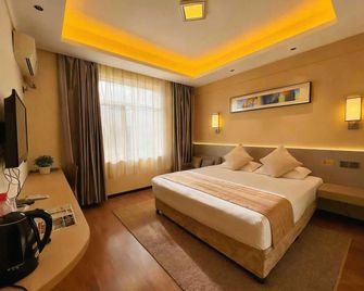 Longsheng Huacheng Business Hotel - Anshan - Schlafzimmer