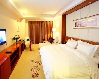 Grand Metropark Hotel Shangqiu - Shangqiu - Habitación