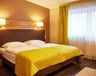 Joos Hotel - Bergheim - Bedroom