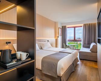 أوكسيدنتال بامبلونا - بنبلونة - غرفة نوم