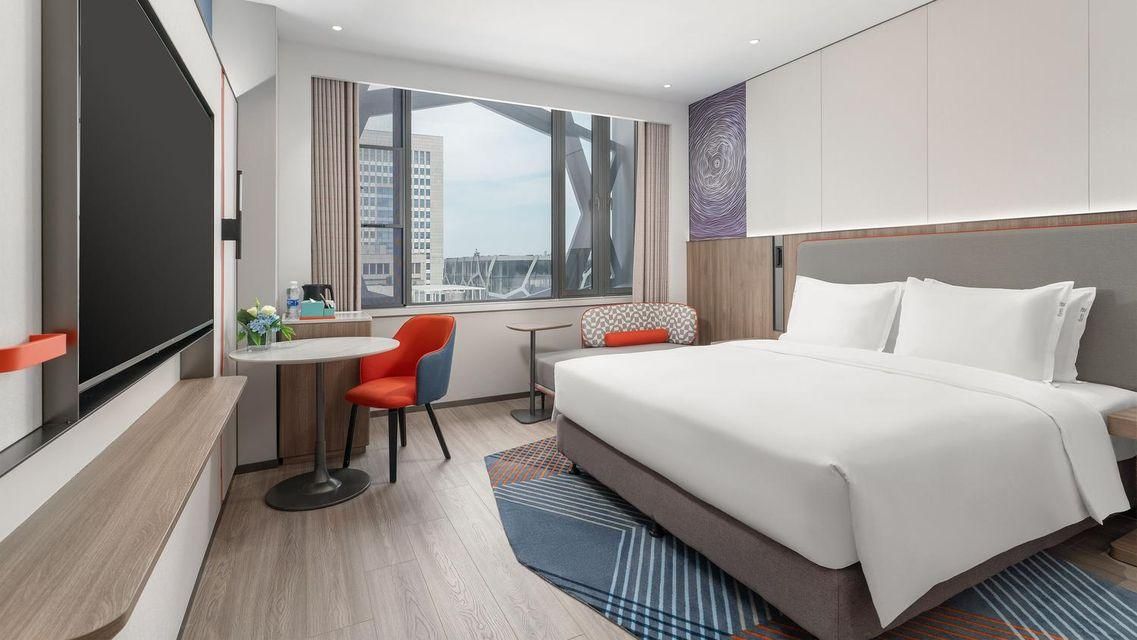 New Beacon Jinyinhu International Hotel - ווהאן - חדר שינה