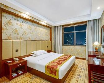 Southern Airlines Hotel - Наньян - Спальня