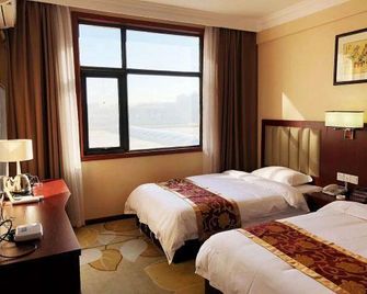 Huojia Dongxi Hotel - Xinxiang - Спальня