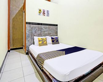 Hotel O Chikam House Syariah - Kediri - Schlafzimmer