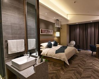 Jiayuguan Ruicheng Sunac Hotel - Jiayuguan - Habitación