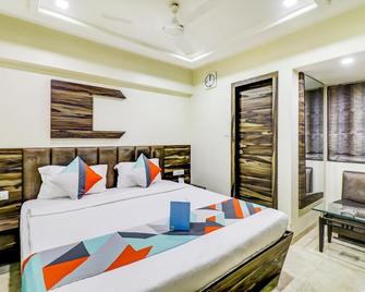 Hotel Palliate - Ахмедабад - Спальня