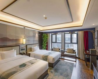 Xinxiang Yunmo Yiju Homestay - Xinxiang - Schlafzimmer