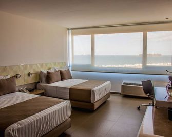 Hotel Punta Azul - בוקה דל ריו - חדר שינה