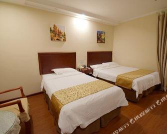 Home Inn Paibai Yun Hotel (Taizhou Wanda Plaza) - Taizhou - Habitación