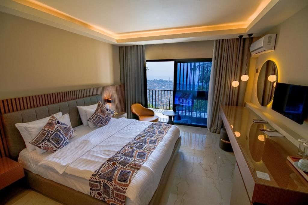 The Country Lodge Hotel - פריטאון - חדר שינה