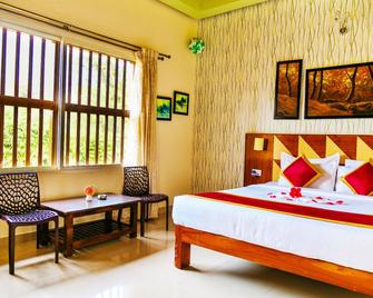 Honeydewwz Exoticaa Hotel & Resort - Chikamagalur - Bedroom