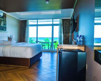 Tanga Beach Resort & Spa - Tanga - Bedroom