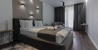 Ares Aparthotel - Cluj Napoca - Bedroom