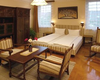 Hotel Manzard Panzio - בודפשט - חדר שינה