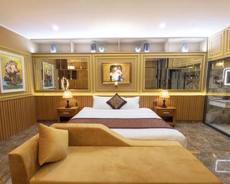 La Fleur Premium Central Apartment Hotel - Dalat - Bedroom