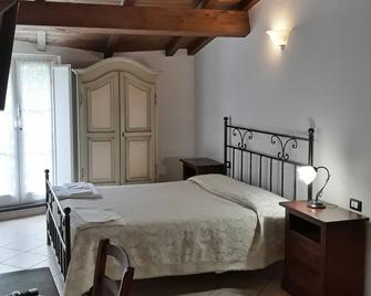 Hotel Paese Corvara - Beverino - Schlafzimmer