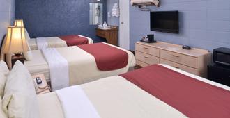 Americas Best Value Inn & Suites Branson - Near The Strip - Branson - Bedroom