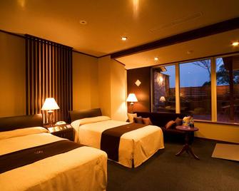 Hotel Beppu Pastoral - בפו - חדר שינה