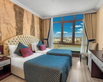 Grand Ani Hotel - Kars - Slaapkamer