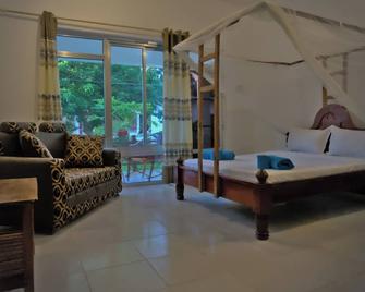 Cocolala Beach House - Nungwi - Habitación