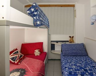 Camping Village Miramare - קאבאלינו טרפורטי - חדר שינה