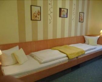 هوتل آم شلوسبارك - ويرنيغرود - غرفة نوم