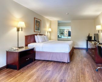 Executive Inn & Suites - Marshall