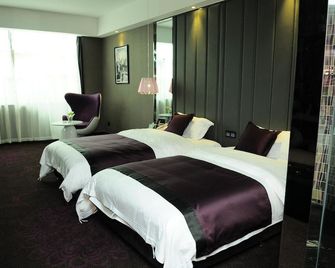 Carnival Fashion Hotel - Wuhan - Habitación