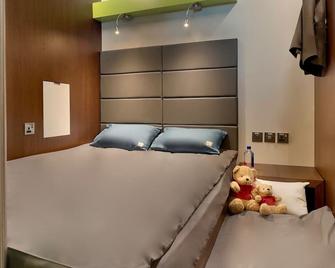 Sleep 'n Fly Sleep Lounge, South Node - Transit Only - Doha - Bedroom