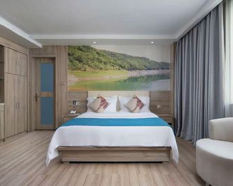 Ankang Four Seasons Hotel - Ankang - Bedroom