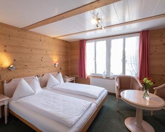 Hotel Chalet Swiss - Interlaken - Schlafzimmer