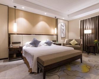 Chunting Hotel - ג'יאנגסו - חדר שינה
