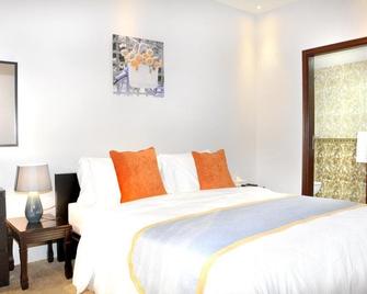 Safari House Hotel - Kuwait City - Phòng ngủ