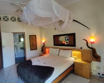 Maison Ambre Guesthouse - ווינדהוק - חדר שינה