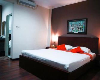 Helios Hotel Malang - Malang - Habitación