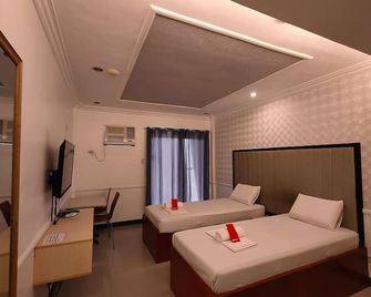 S and M Hotel Inc. - Mandaue City - Schlafzimmer