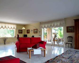 Asso Bed & Breakfast - Manerba del Garda - Huiskamer