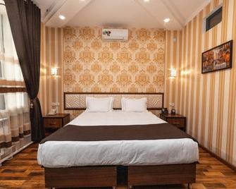 Asmald Palace Hotel - Kokand - Camera da letto