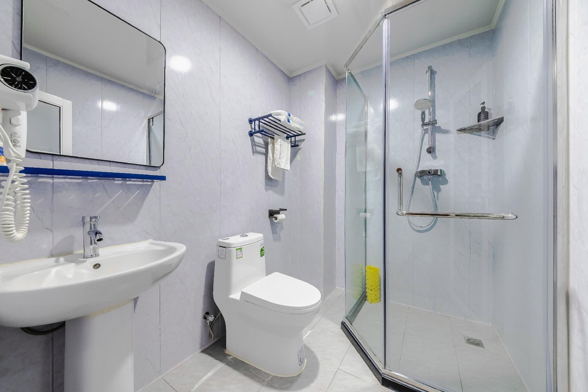 7Days Inn Qingdao Haiyunan Xinglong Road - تشينغداو - غرفة نوم