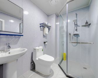 7Days Inn Qingdao Haiyunan Xinglong Road - Qingdao - Habitación