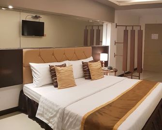 North Tourist Inn - Bacolod - Bedroom