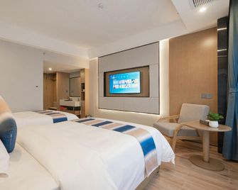 Zhangjiajie Fulante News Business Hotel - Zhangjiajie - Habitación