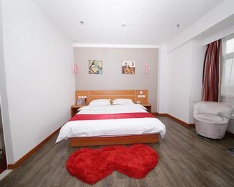Thank Inn Chain Hotel Hebei Baoding Laiyuan New Bus Station - Baoding - Habitación