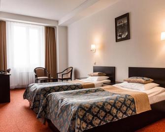 Flagman Hotel - 鄂木斯克 - 臥室